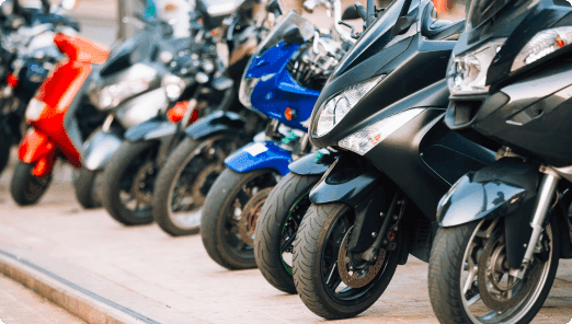 a row of motorcycles parked